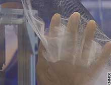 Protective clothing of the future could be sprayed on. This prototype feels like a cross between cotton candy and strong plastic fibers.
