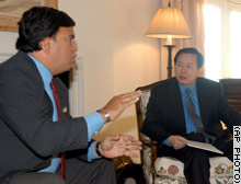 Richardson talks with North Korean diplomat Han Song Ryol.