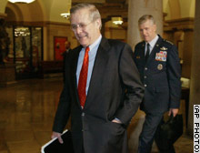 Defense Secretary Donald H. Rumsfeld, left, and Joint Chiefs Chairman Gen. Richard Myers on Capitol Hill Wednesday