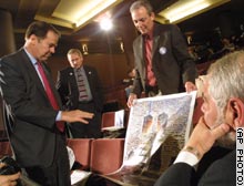 Thomas Kean, commission chairman, and September 11 victims' family members.