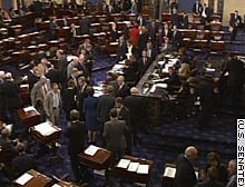 The Senate voted to convert half of President Bush's $20.3 billion Iraqi rebuilding plan into a loan.