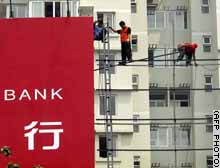 Reform of China's banking system must precede any floating of the yuan, according to analysts. 