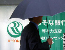 Shares in Resona are down sharply on reports of a government sale.