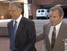 Kerkorian, left, arrives at a U.S. court for his case against DaimlerChrysler.