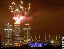 New Year's fireworks light up Canary Wharf Tower in London.