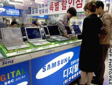 Samsung says it will lift spending on smart cards, sensors and chip lines