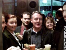 Keeling, shown with One.Tel staff, has agreed to a 10-year ban.
