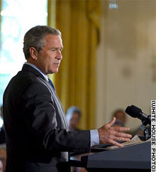President George W. Bush discusses his HIV/AIDS initiative in the East Room Tuesday,
