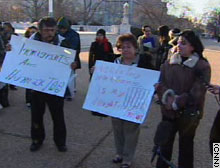 The case drew protests outside the Supreme Court Wednesday.