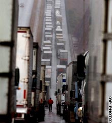 Trucks were backed up on a Mexican toll road near the U.S. border this past December in Nogales, Mexico.