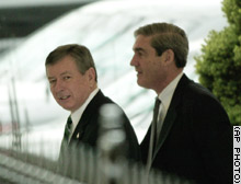 Attorney General John Ashcroft, left, and FBI Director Robert Mueller arrive at the White House for an intelligence meeting with President Bush earlier this week.
