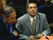 Defense attorney Mark Geragos, left, with Scott Peterson in a court appearance this past spring.