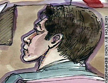 Peterson listens during the hearing.
