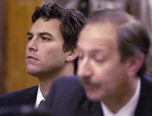 Scott Peterson listens during his arraignment Wednesday.