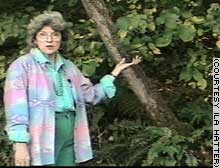 Southern naturalist Ila Hatter displays a Spice Bush, which is used by some to relieve arthritis pain.
