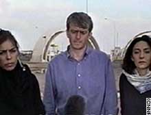 CNN's Ingrid Formanek, from left, Nic Robertson and Rym Brahimi answer questions after arriving in Jordan from Baghdad.
