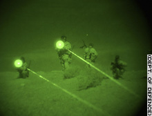 Australian soldiers from the 4th Battalion, Royal Australian Regiment on night patrol.