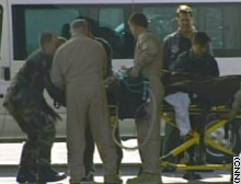 The first injured U.S. troops arrive at Ramstein Air Base in Germany.