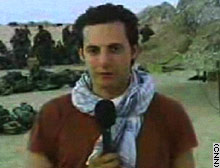 CNN.com - U.S. Marines aid wounded Iraqi civilians - Mar. 28, 2003