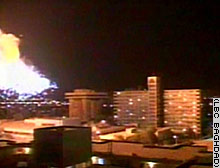 Blasts lit up the night sky over Baghdad late Saturday.