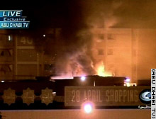 Flames rise over downtown Baghdad after coalition airstrikes overnight.