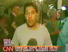 CNN's Dr Sanjay Gupta reporting by videophone from the 'Devil Docs' field hospital.