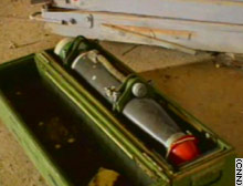 This suspected chemical warhead discovered at an air base near Kirkuk is marked with a green band, which sources said is the symbol for chemical weaponry.