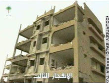 Officials said they suspect al Qaeda in the explosions, which tore through three compounds housing Americans in Riyadh.