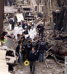 Turkish police search the rubble and debris for clues in the bombing near the Neva Shalom.