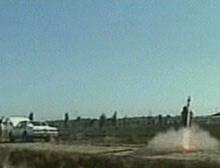 The videotape shows a man firing what appears to be a surface-to-air missile, then cuts to images of an apparently damaged cargo plane landing at Baghdad airport.