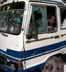 An Iraqi passenger bus was struck by the blast of an explosive device on Friday in southeastern Baghdad in an attack that killed at least three Iraqis and one U.S. soldier.