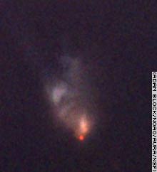 An image from Kitt Peak shows McNeil's Nebula in true colors.
